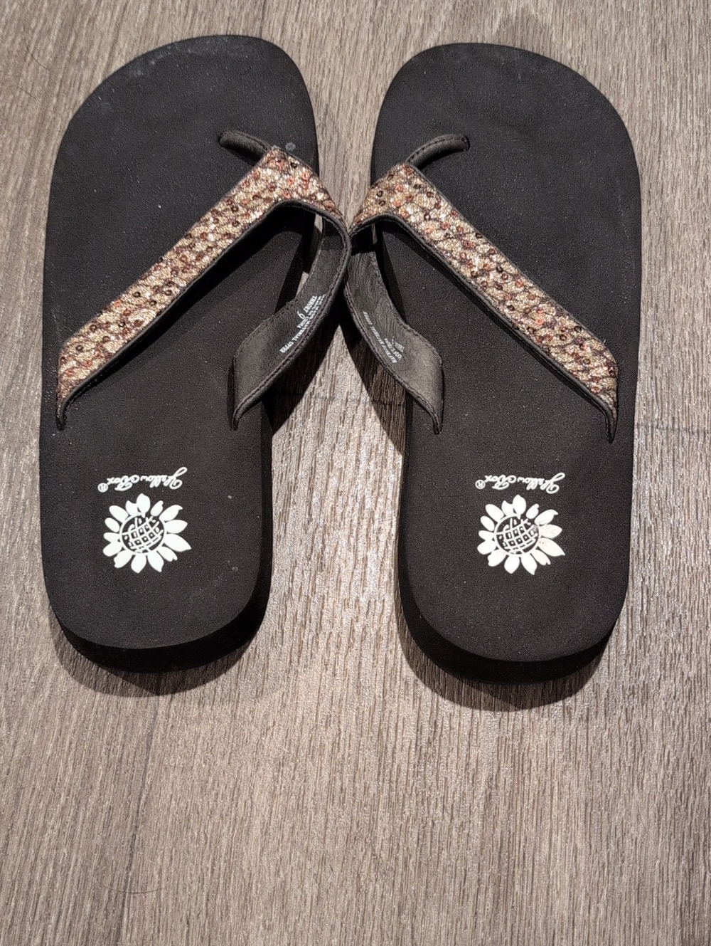 Yellow Box Women’s Black Flip Flop Sandals with Metallic Braided Straps